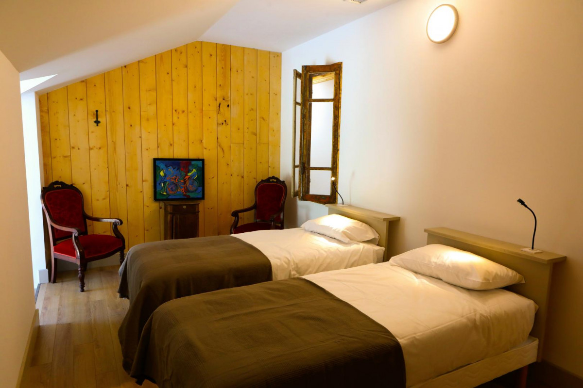 Chambre dans l'un des 4 chalets indépendants